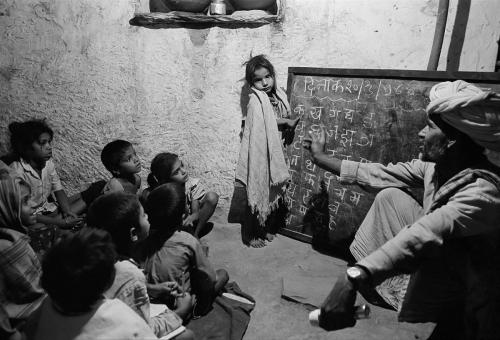 Working children attending evening classes, Tilonia, India